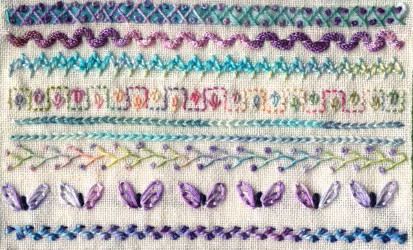 sample of hand embroidery stitched on linen in hand dyed threads
